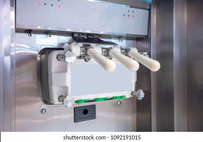 Three faucets commercial soft serve ice cream machine in store