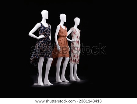  Three female fashion dress on a full mannequin,
