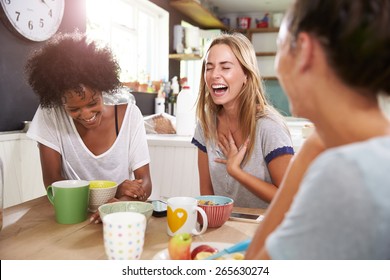 Three Female Friends Enjoying Breakfast At Home Together - Powered by Shutterstock