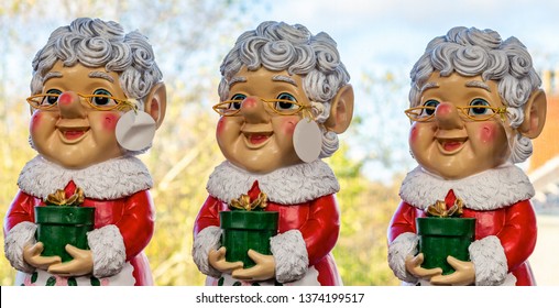 Three Festive Christmas Granny Garden Gnomes. Stockport, Cheshire, UK.