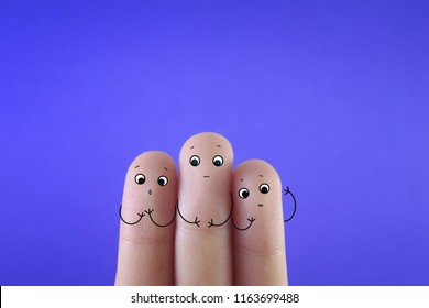 Three Fingers Decorated As Three Friends. One Of Them Is Suffering From Wilson Disease.