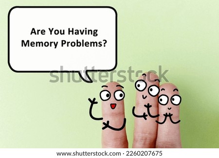 Three fingers are decorated as three person. One of them is asking another two if they have memory problems.