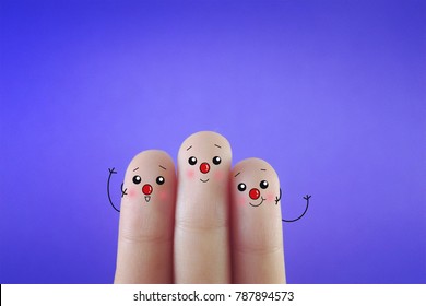 Three Fingers Decorated As Three Person Wearing Red Noses. Suitable To Be Used For Anything About Red Nose Day.