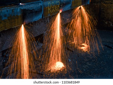 Three Flame Welding Torch, Burning A Thick Steel Plate
