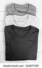 Three Folded T-shirts. Converted In Black And White