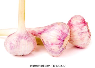 three fresh garlic head isolated on white background