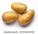 Three fresh potatoes isolated on white background; healthy raw food; top view