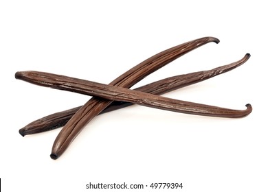 Three Fresh Vanilla Pods On White Background