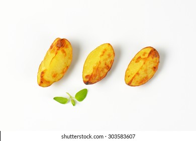 Three Fried Potatoes On White Background