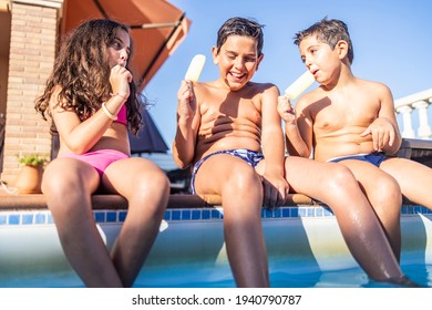 Three Funny Kids Eating An Ice Lolly