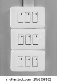 Three Gang Way Light Switches In Black And White