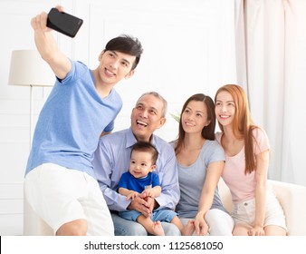 Three Generation Asian Family Taking Selfie