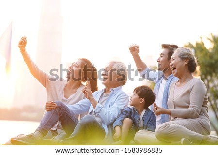 Similar – Image, Stock Photo Three boys take a run for the jump into the sea