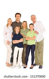 Three Generations Family Standing Isolated On White Background