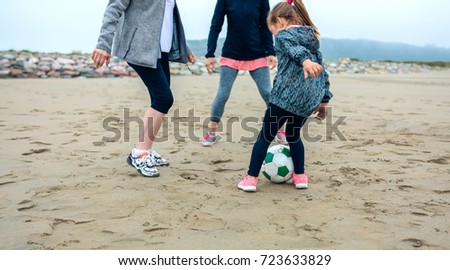 Similar – Three generations female playing on the beach