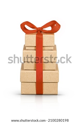 Three gift boxes, large, medium, small, are displayed in a pyramid and tied with a red ribbon. Cut Out