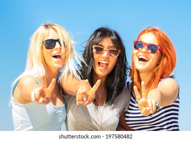 Three Girlfriends Showing A V Hand Sign