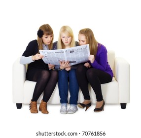 Three Girlfriends Teen Read With Interest Newspaper Sitting On The Couch