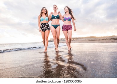 three-girls-friends-walking-on-260nw-128
