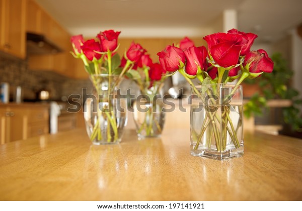 Three Glass Vases Red Roses Sitting Stock Photo Edit Now 197141921