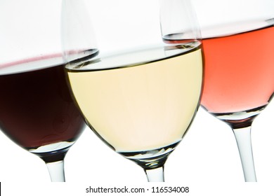 Three Glasses With White, Rose And Red Wine