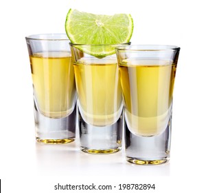 Three Gold Tequila Shots With Lime Isolated On White Background 