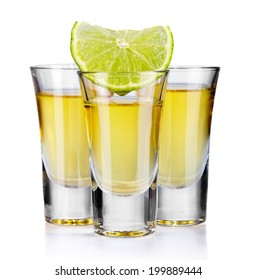 Three Gold Tequila Shots With Lime Isolated On White Background 