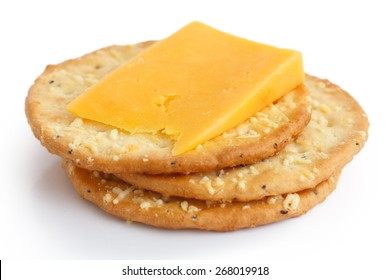 Three Golden Cheese Crackers On White. With Cheese.