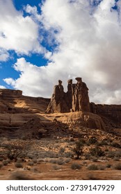 Three Gossips with dramatic clouds. Arches National Park, Moab, Utah. January 2026.