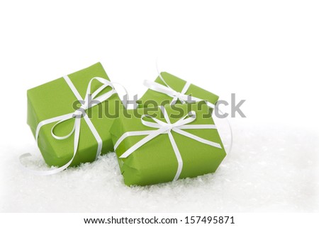 Three green Christmas gift boxes isolated on white background 