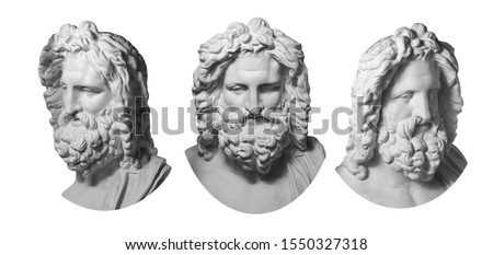 Three gypsum copy of antique statue Zeus head isolated on white background. Plaster sculpture man face with beard.