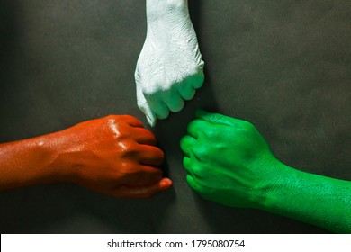 Three Hands Are Painted With Three Colors,saffron,white And Green To Represent Tricolor Indian National Flag.15 August Independence Day India.celebration Of Freedom.symbol Of Brotherhood.   