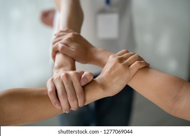 Three hands were a collaboration concept of teamwork
