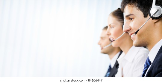 Three Happy Customer Support Phone Operators At Office