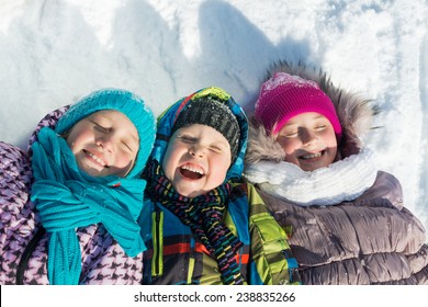 Three Happy Kids Having Fun In Winter Park