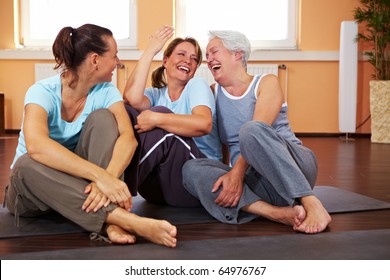 Three Happy Women Sitting In A Gym