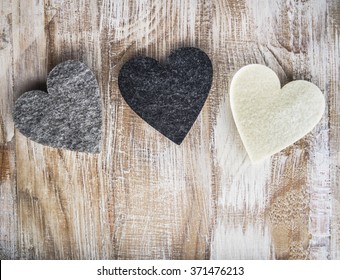 Three hearts on  the rustic board