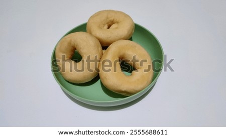 Similar – Image, Stock Photo Baked sweet potato with vegetable filling.
