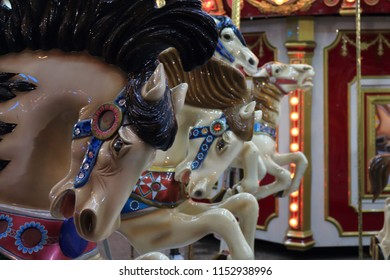 Three Horses Lined Up On The Carousel On The Midway. No People. California State Fair