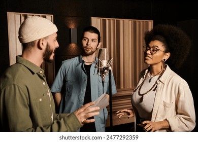 Three individuals converse animatedly in a recording studio, preparing for a music band rehearsal. - Powered by Shutterstock