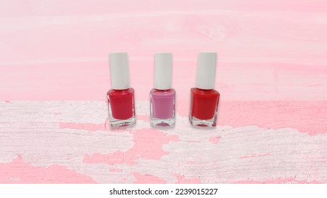 Three isolated nail polish pink gradient background and texture