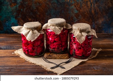 Three jars of pickled beetroot and cauliflour - Powered by Shutterstock