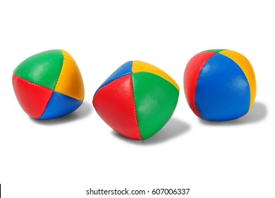 Three Juggling Balls On White Background