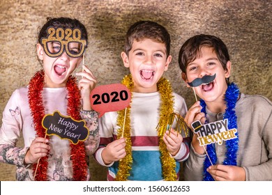 Three Kids Celebrating New Years Eve. 2020!