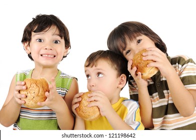 Three Kids Eating Burgers