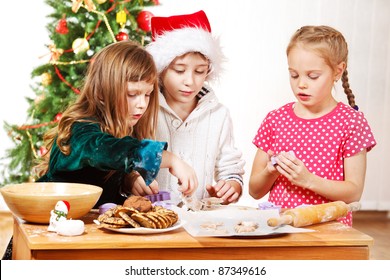 Three Kids Making Christmas Cookies