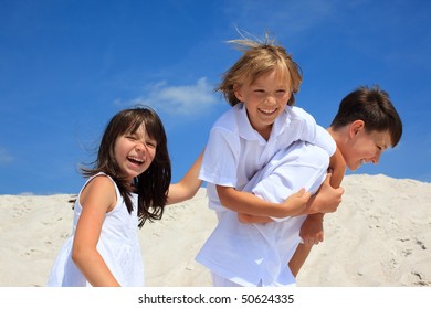 Three Kids On Beach