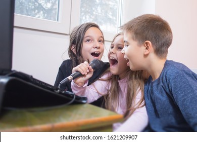 Three Kids Singing Karaoke Together