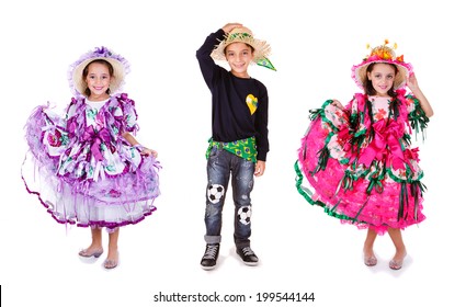 Three Kids Wearing Generic Caipira Clothes As In Every Festa Junina Or June Festivals In Brazil.