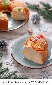 Three Kings Day Cake Or Bread On Rustic Background, Top View. Traditional Seasonal Epiphany Food On Christmas Decorated Table, Top Down, Copy Space